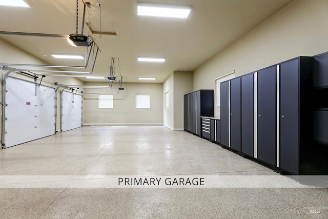 2634 W Sugarberry Dr, Eagle, ID 83616 - garage with a garage door opener and baseboards