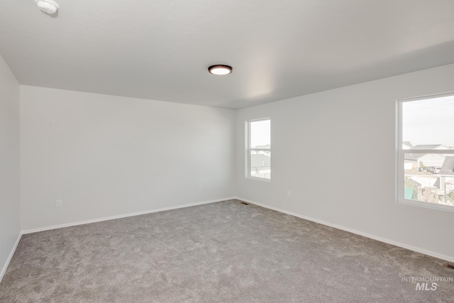 view of carpeted spare room