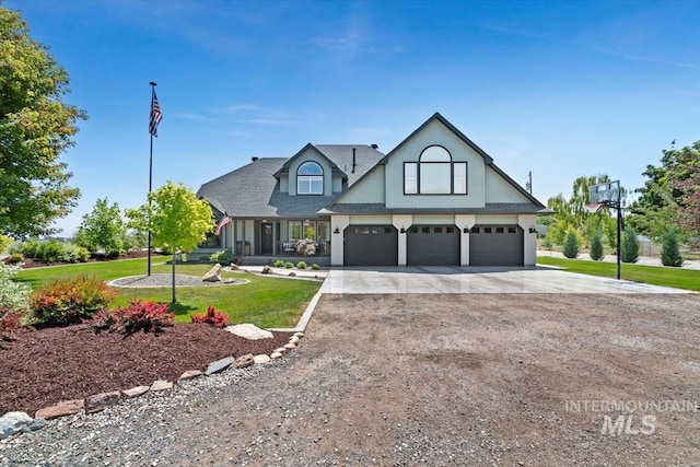 511 Keogh Ln, Caldwell, ID 83607 - view of front of home with concrete driveway, a front yard, an attached garage, and a shingled roof