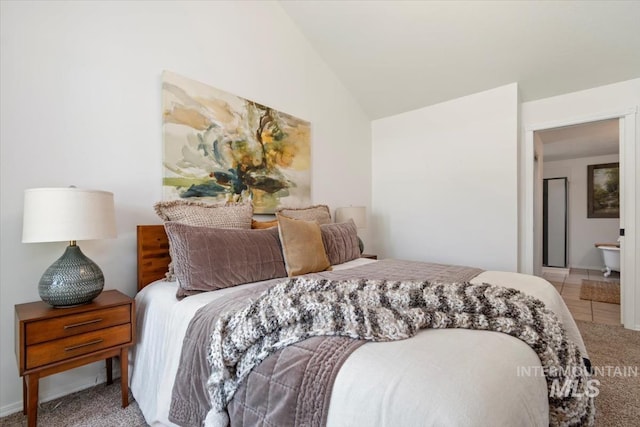 511 Keogh Ln, Caldwell, ID 83607 - carpeted bedroom featuring lofted ceiling