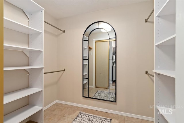 511 Keogh Ln, Caldwell, ID 83607 - spacious closet with tile patterned floors
