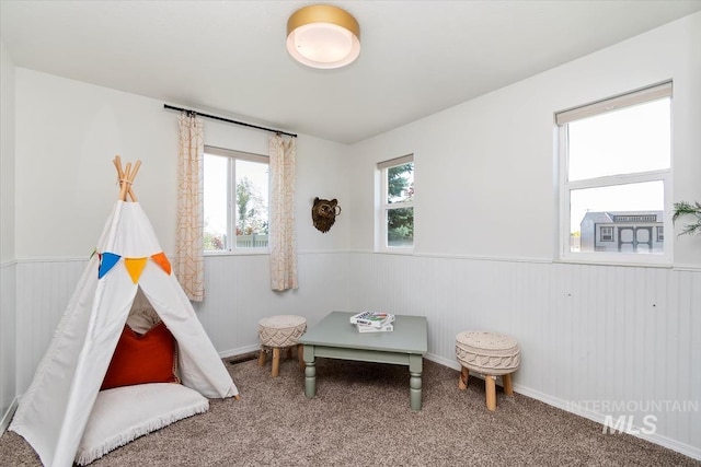 511 Keogh Ln, Caldwell, ID 83607 - game room featuring wainscoting and carpet floors