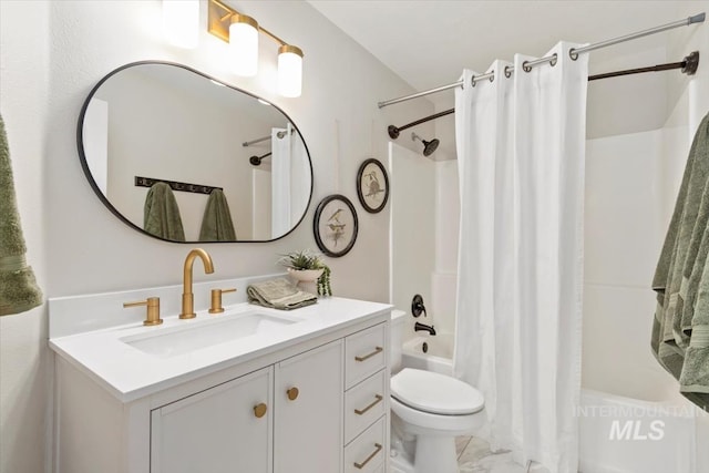511 Keogh Ln, Caldwell, ID 83607 - bathroom with vanity, shower / tub combo with curtain, toilet, and marble finish floors