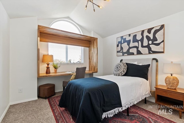 511 Keogh Ln, Caldwell, ID 83607 - carpeted bedroom featuring lofted ceiling and baseboards