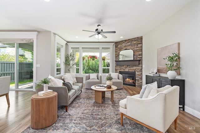 5404 S Palatino Ave, Meridian, ID 83642 - living area with ceiling fan, wood finished floors, a fireplace, and recessed lighting