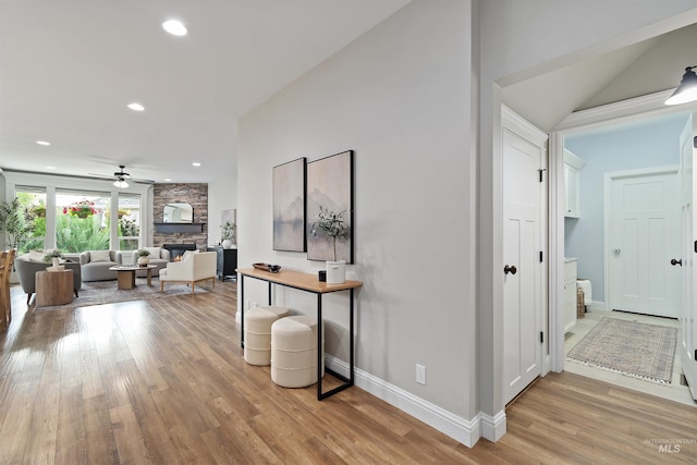 5404 S Palatino Ave, Meridian, ID 83642 - hallway with light wood-style flooring and recessed lighting