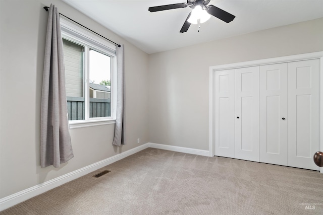 5404 S Palatino Ave, Meridian, ID 83642 - unfurnished bedroom with carpet flooring, a closet, and a ceiling fan