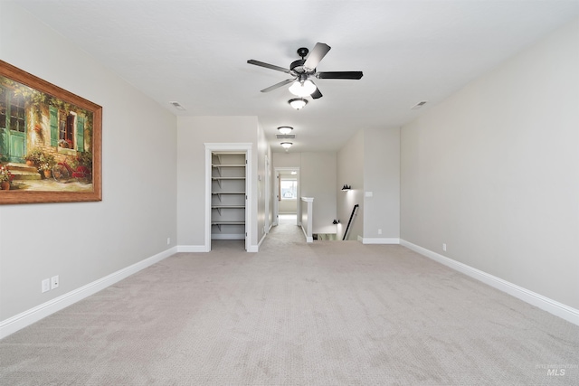 5404 S Palatino Ave, Meridian, ID 83642 - unfurnished living room featuring a ceiling fan and carpet