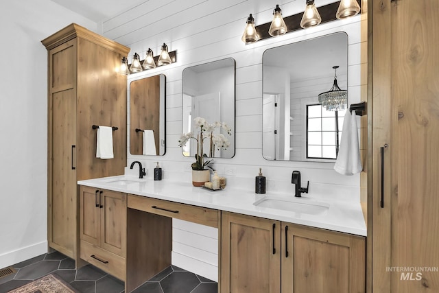 bathroom with tile patterned floors and double vanity