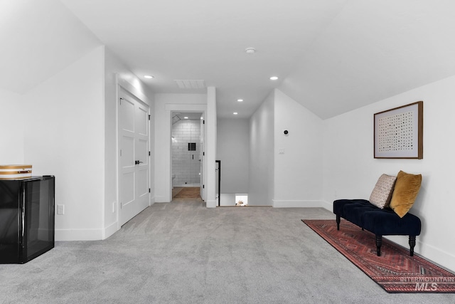 living area featuring carpet, recessed lighting, and baseboards