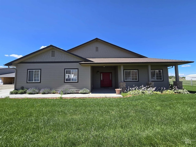 view of front of home with a front lawn