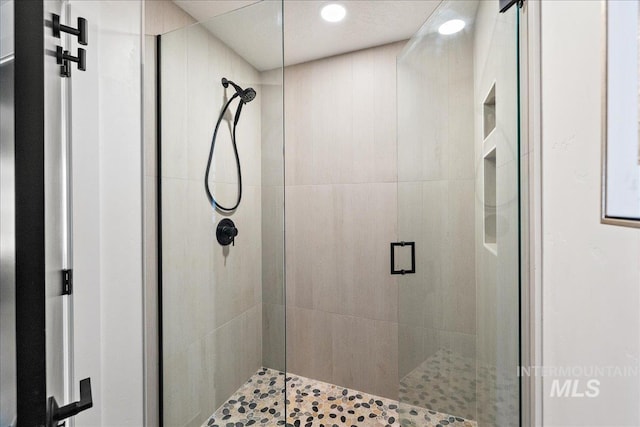 full bathroom with a stall shower