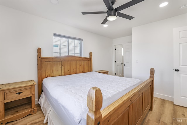 bedroom with baseboards, a ceiling fan, light wood-style flooring, and recessed lighting