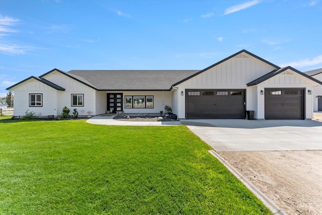 6623 Red Rock Rd, Marsing, ID 83639 - modern inspired farmhouse with board and batten siding, a garage, a front yard, and driveway
