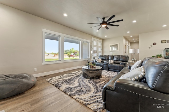 6623 Red Rock Rd, Marsing, ID 83639 - living room with ceiling fan, wood finished floors, baseboards, and recessed lighting