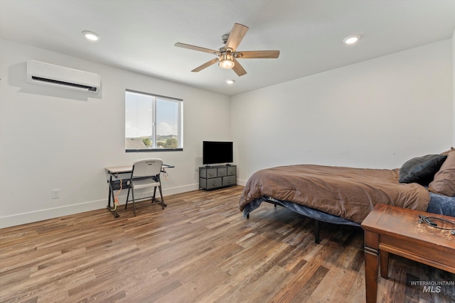 6623 Red Rock Rd, Marsing, ID 83639 - bedroom featuring a wall mounted AC, light wood-style floors, baseboards, recessed lighting, and ceiling fan
