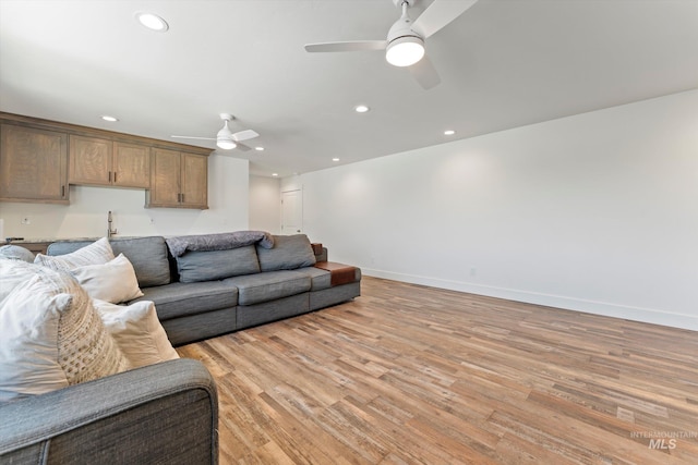 6623 Red Rock Rd, Marsing, ID 83639 - living room featuring ceiling fan, light wood-type flooring, baseboards, and recessed lighting