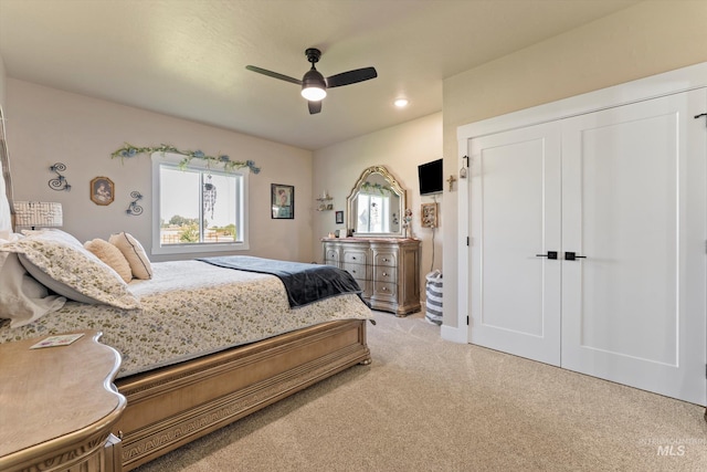 6623 Red Rock Rd, Marsing, ID 83639 - bedroom featuring light carpet, ceiling fan, and a closet