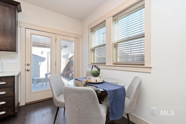 dining room with dark wood-style floors