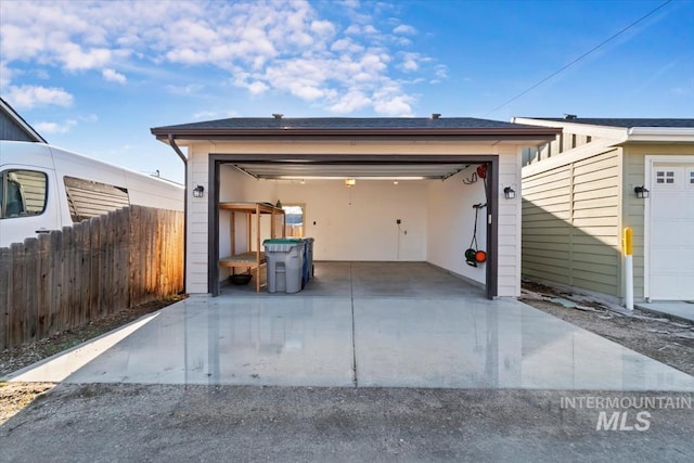 garage featuring fence