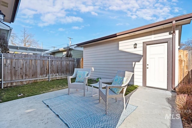 view of patio / terrace with fence