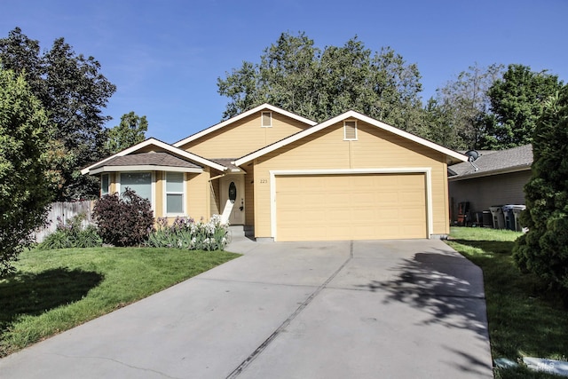 225 E Bayview, Boise, ID 83706 - ranch-style home featuring a garage and concrete driveway