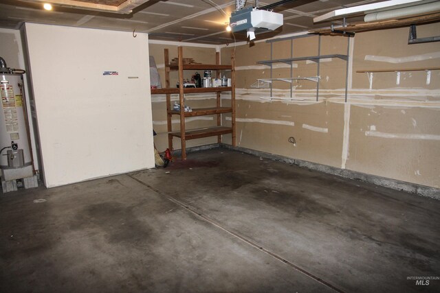 225 E Bayview, Boise, ID 83706 - garage featuring water heater and a garage door opener