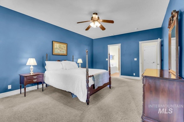 2627 E Moog St, Meridian, ID 83646 - carpeted bedroom with baseboards, a ceiling fan, and ensuite bath