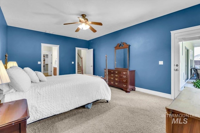 2627 E Moog St, Meridian, ID 83646 - bedroom with baseboards, carpet flooring, ensuite bathroom, and ceiling fan