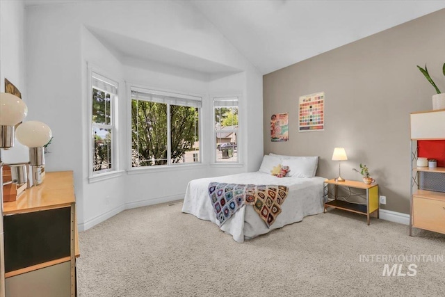 2627 E Moog St, Meridian, ID 83646 - carpeted bedroom with lofted ceiling and baseboards
