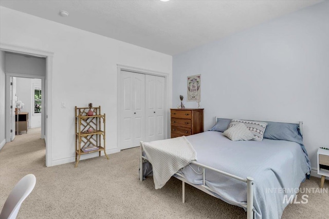 2627 E Moog St, Meridian, ID 83646 - bedroom with light carpet, a closet, and baseboards