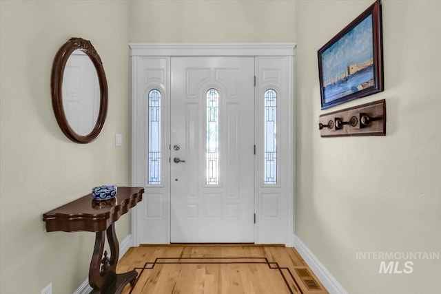 2627 E Moog St, Meridian, ID 83646 - entryway with light wood-type flooring and baseboards