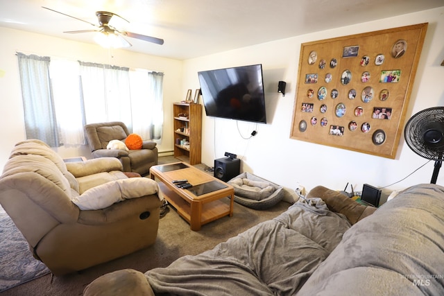 carpeted living room with a ceiling fan and baseboard heating