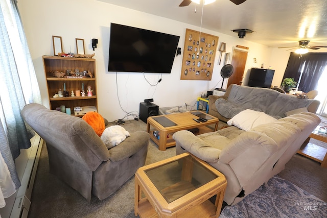 living area with carpet flooring, a ceiling fan, and baseboard heating