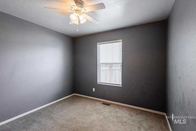 9885 W Tilmont St, Boise, ID 83709 - spare room featuring carpet, ceiling fan, and baseboards