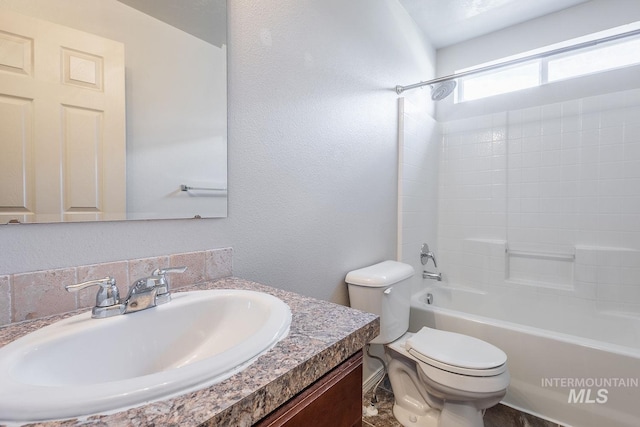 9885 W Tilmont St, Boise, ID 83709 - bathroom featuring toilet, vanity, a textured wall, and shower / tub combination