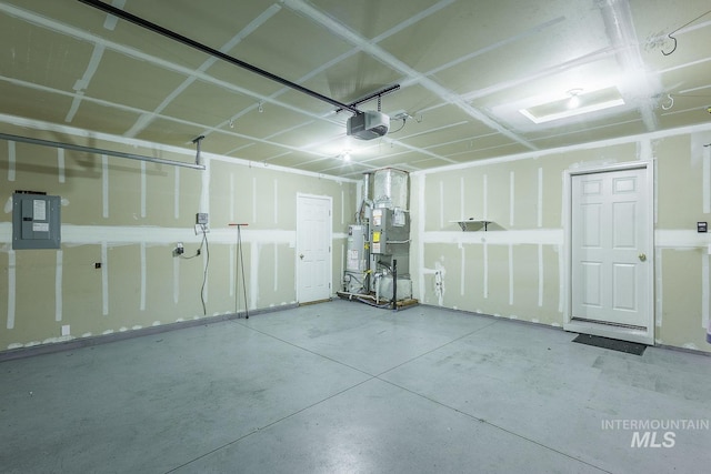 9885 W Tilmont St, Boise, ID 83709 - garage with electric panel, water heater, and a garage door opener