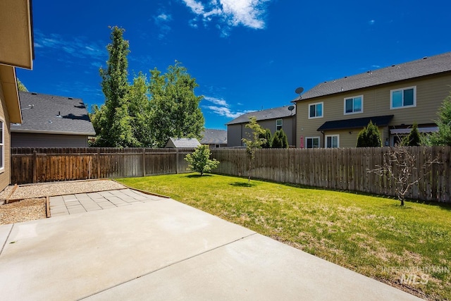 9885 W Tilmont St, Boise, ID 83709 - view of yard with a patio