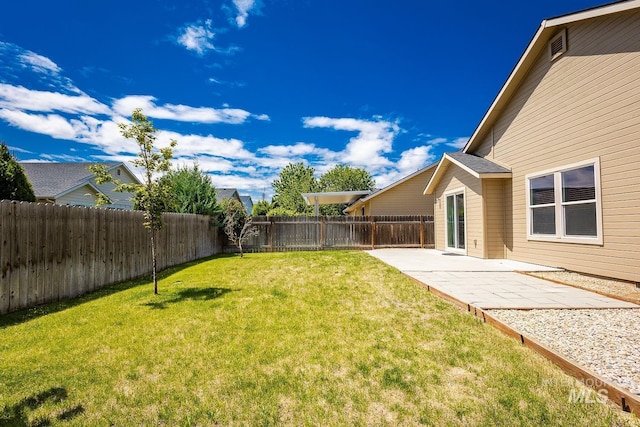 9885 W Tilmont St, Boise, ID 83709 - view of yard with a patio area