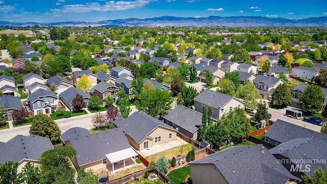 9885 W Tilmont St, Boise, ID 83709 - aerial perspective of suburban area featuring mountains
