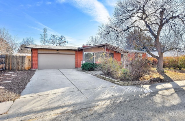 single story home featuring a garage