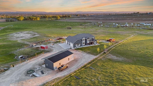 17293 Goodson Rd, Caldwell, ID 83607 - aerial view at dusk with a rural view