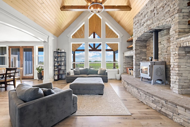 17293 Goodson Rd, Caldwell, ID 83607 - living area featuring wood ceiling, wood finished floors, ornate columns, high vaulted ceiling, and beam ceiling