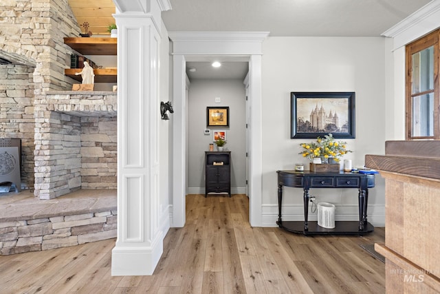 17293 Goodson Rd, Caldwell, ID 83607 - hallway with ornamental molding, wood-type flooring, decorative columns, and baseboards