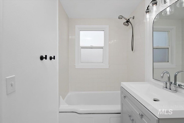 full bathroom featuring bathtub / shower combination and vanity