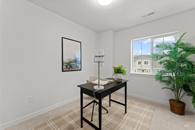 view of carpeted home office