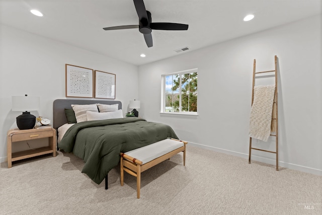 bedroom with light carpet and ceiling fan