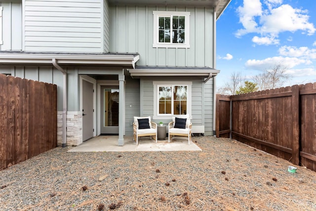 back of house featuring a patio