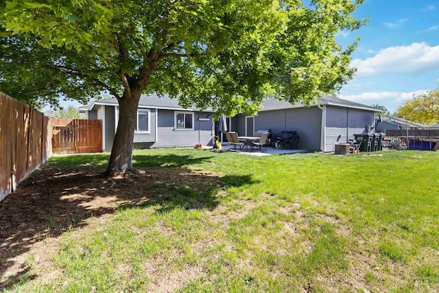 rear view of property featuring a patio