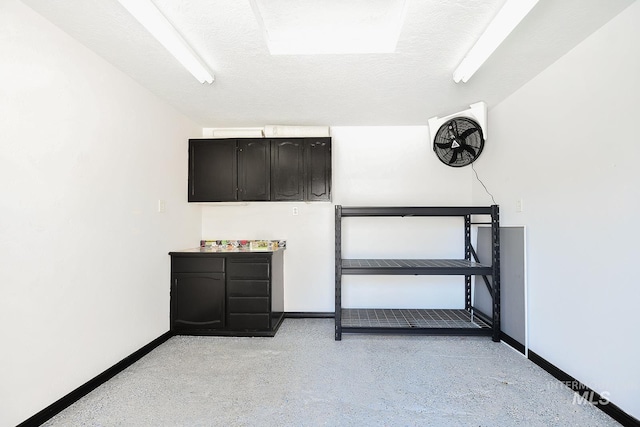 interior space featuring a textured ceiling